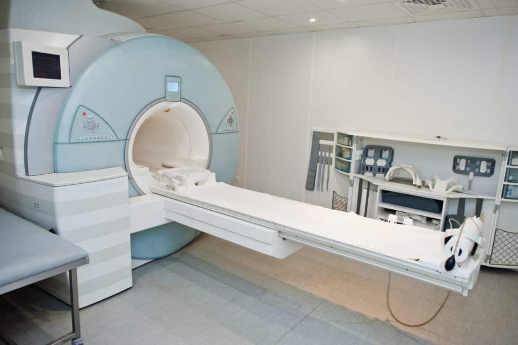 Magnetic resonance imaging scan or MRI machine device in hospital.
